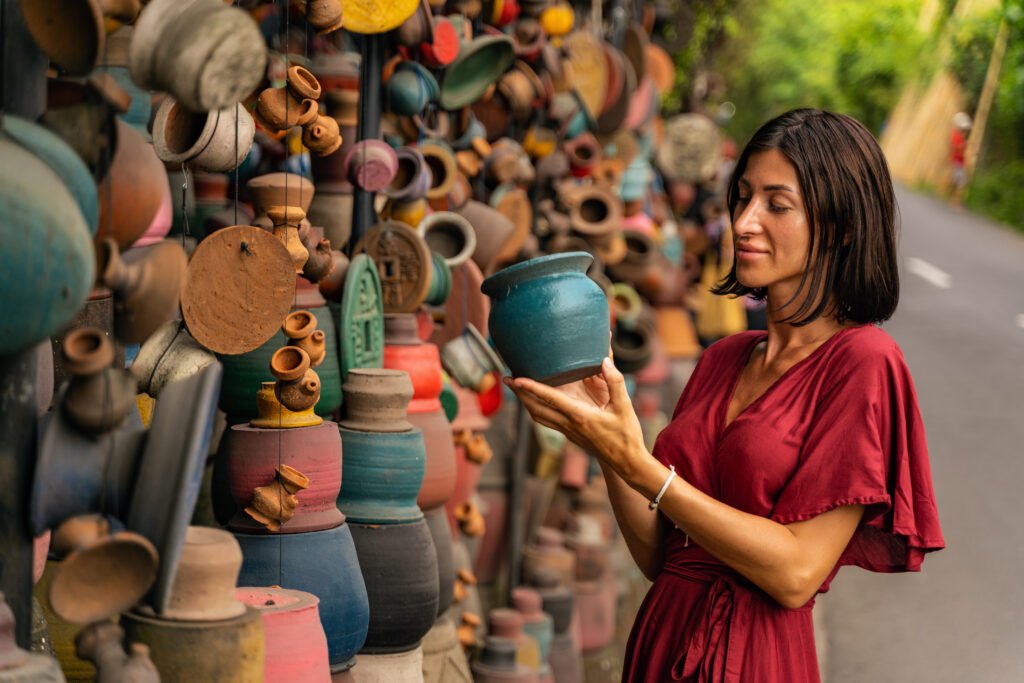 Portrait of charming girl that looking at pot